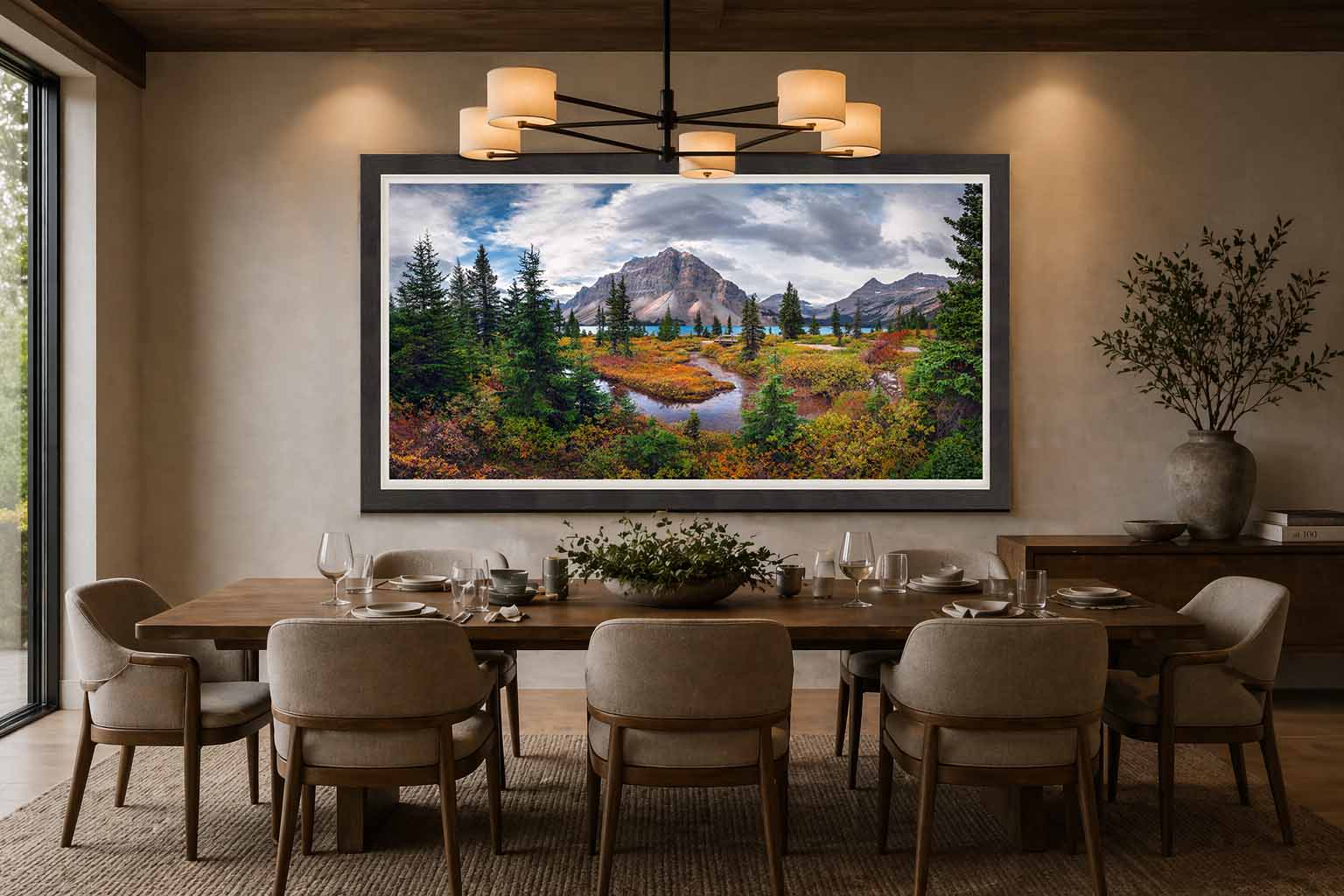Bow Lake and its autumn meadow in Banff National Park, framed in charcoal with a white linen liner above a table in a warm dining room