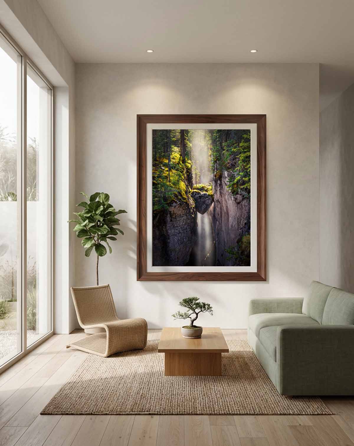 Heart of the Forest at 40 by 60 inches in a Collector's Choice presentation, framed with a linen liner in a walnut moulding, hanging above a seating area in a light-filled living room.