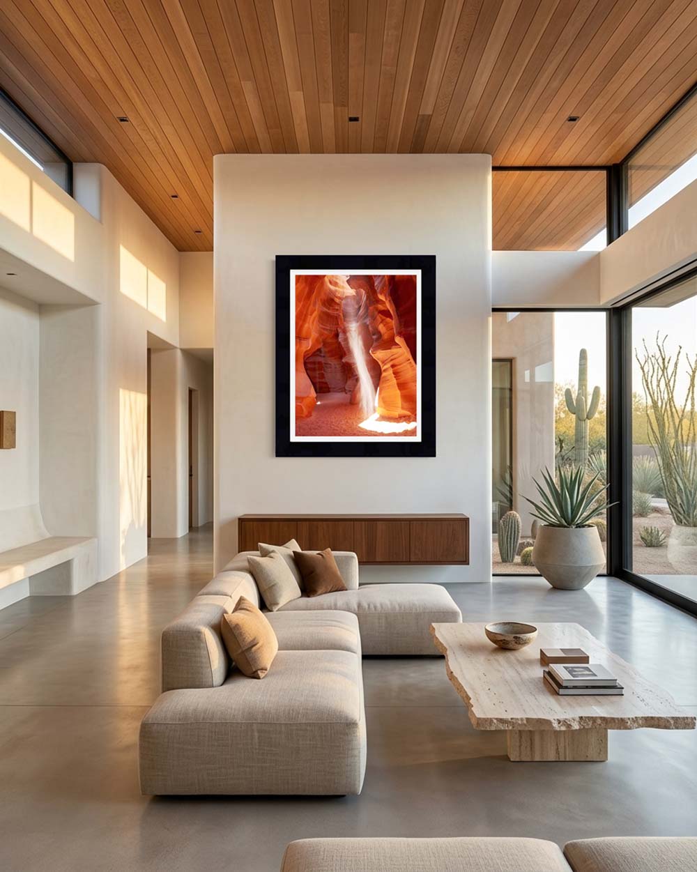 Shapeshifter at 40 by 50 inches in a black float frame, hanging above a walnut console on a plaster wall in a desert home.
