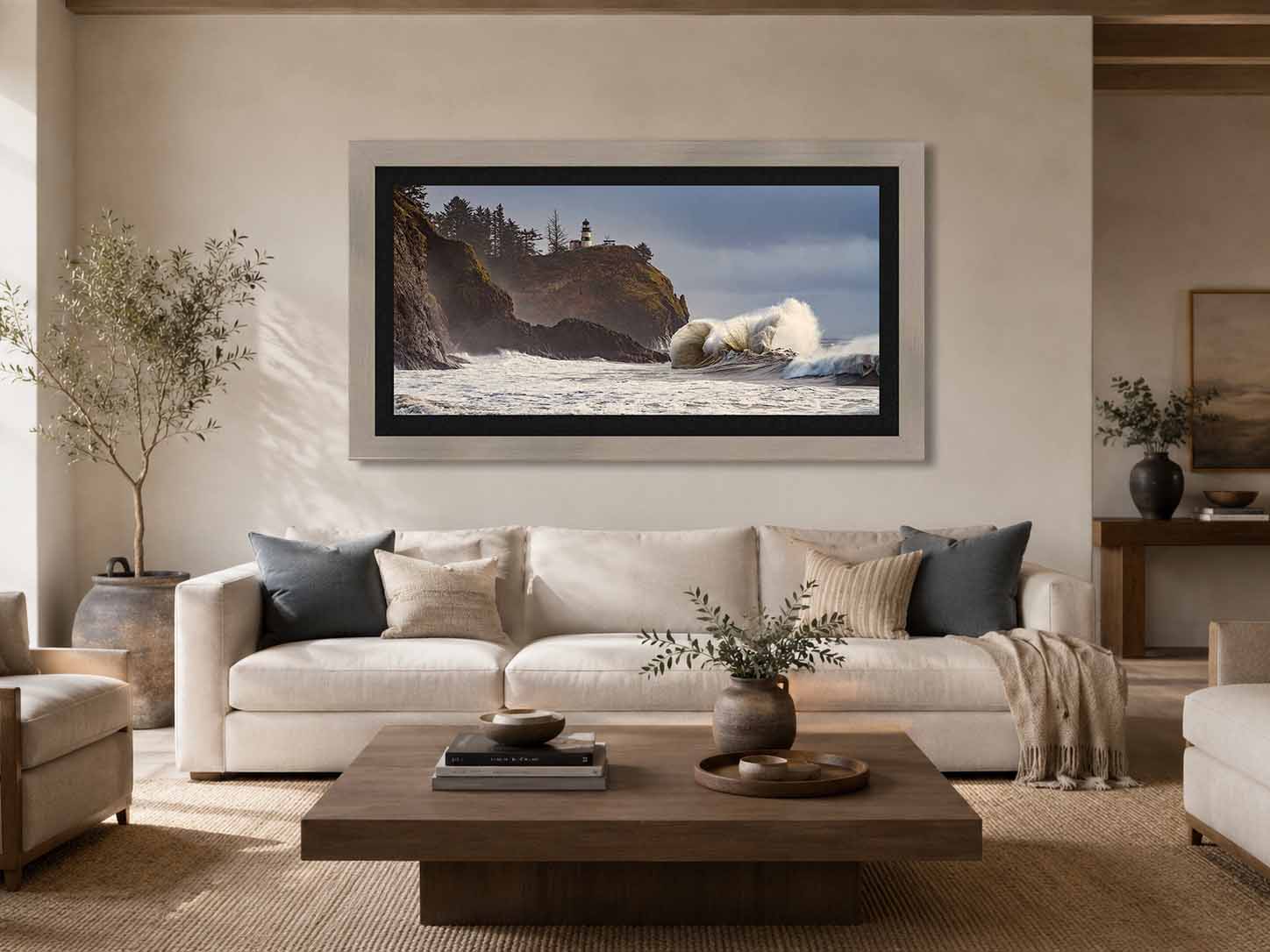 The Steady Light shown as a framed print above a sofa in a plaster and oak living room, in a Ramino Night Silver moulding with a black linen liner